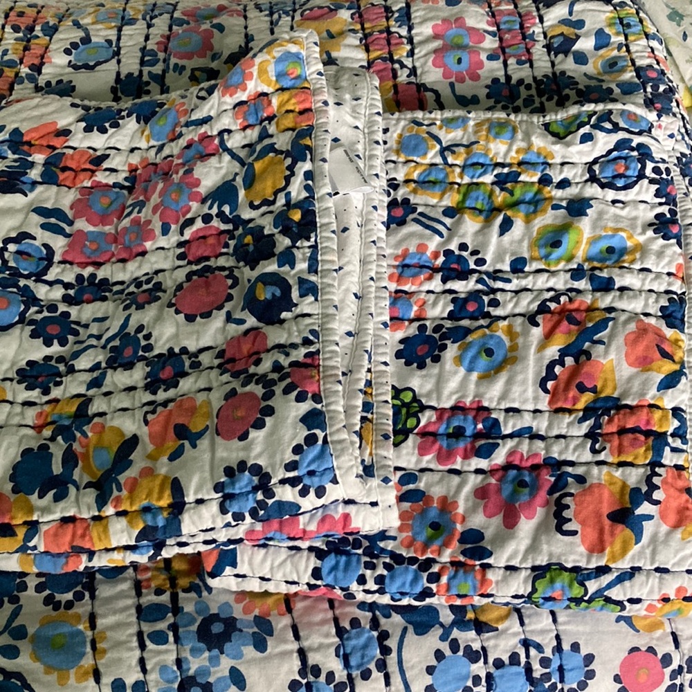 Queen sized Vera Bradley reversible quilt with two standard sized matching shams
